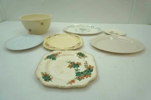variety of vintage china plates and vintage stoneware bowl