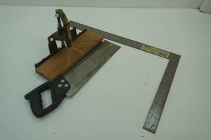 miter box with saw, framing square
