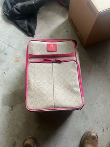 coach suitcase and purse