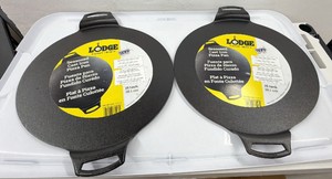 Lot of 2-  Brand New Lodge brand cast-iron seasoned pizza pans - both are 15 inches in size