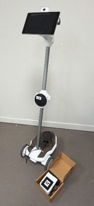 telepresence robot  a mobile video-conferencing unit on wheels, with a tabletscreen at the top for video calls, a camera above it,