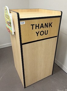 full-size standup garbage can housing container - wooden trashwaste receptacle bin  specifically the kind used in fast-food has a Margaritaville its 5 oclock somewhere sign attached to it with bottle opener as well