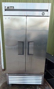 True refrigerator . model number T  35. condition unknown sold as is