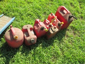 Variety of plastic gas cans with on...