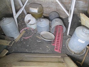 Various metal chicken feeders and o...