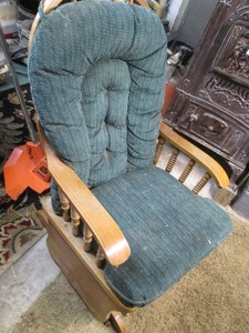 Wood framed glider rocker with upho...