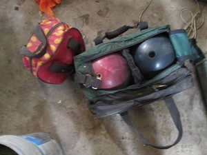 Trio of bowl8ng balls with bags...