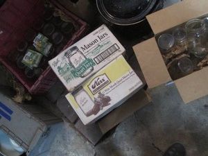 Variety of canning jars and lids in...