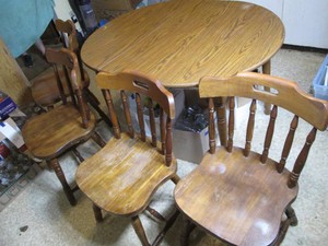 Round kitchen table with 4 matching...