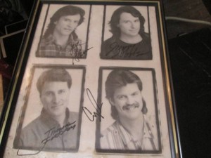 Framed and signed Nitty Gritty Dirt...