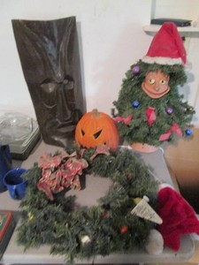 Carved wood mask, lighted jack-o-la...