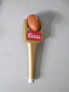 Coors football bar tap...