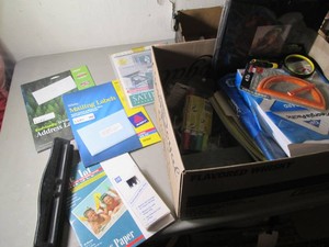 Box of office supplies including co...