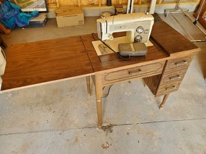 Sears Kenmore Sewing Machine Housed within a Matching Wood Cabinet