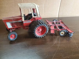 International Harvester Tractor with Plow