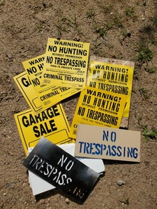 Lot of No Hunting, No Trespassing Signs
