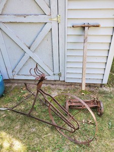 Vintage single Wheel Cultivator and Vintage Push Lawn Mower