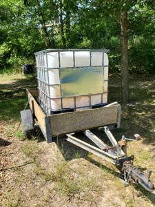 Trailer with Water Tank Set Up Has Pump in working Condition