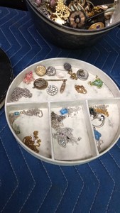 round jewelry box of jewelry
