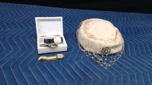 Marble stone box of vintage watches and a vintage ladies hat