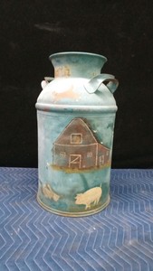 Vintage painted milk can