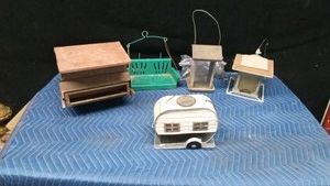 Tote of metal bird feeders