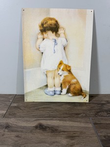 Vintage tin reproduction of the famous artwork titled In Disgrace by the prominent American artist and illustrator Bessie Pease Gutmann.
