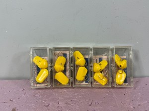 5 - Vintage yellow Rinkie Dink duck fishing lures packaged in clear plastic boxes