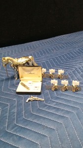 Anson Cuff Links, Tie clip, Metal Horse and guitar tuning heads with pearloid buttons (seller says they came off Willie Nelsons guitar that deteriorated in her Dads basement)