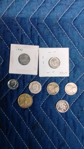 No mint marked coins, 2 Queen Elizabeth II British coins and a guardian angel token. (See description for more onfo)