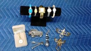 7 watches, truck belt buckle, czechoslovakia pipe cleaner and more