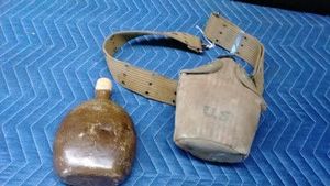World War II Imperial Japenese Army aluminum field canteen and a US canteen on belt