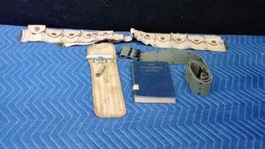 Military ammo belt belt, gun cleaning kit and blue Kackets manual
