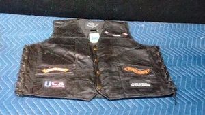 New Buffalo leather vest with several parches