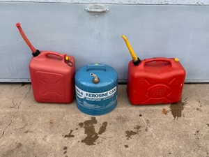 2 - Gas Cans and 1 Kerosene Can