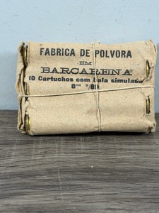 Vintage Portuguese military paper packet of 8mm Kropatschek (M1889) rifle ammunition, produced at the Barcarena Gunpowder Factory (Fbrica de Plvora em Barcarena), containing 10 practice or blank cartridges with simulatedwooden bullets