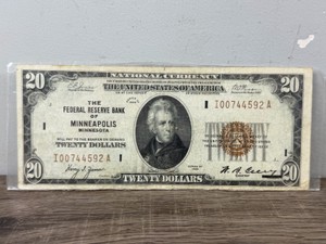 Series 1929 $20 Federal Reserve Bank Note from the Federal Reserve Bank of Minneapolis, Minnesota, featuring a brown Treasury seal and a portrait of Andrew Jackson.