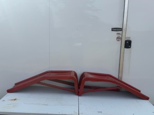 Pair of red metal car ramps