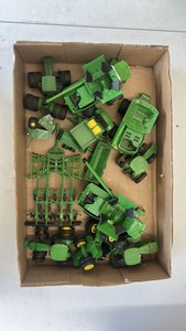 John Deere 164th tractors, combines, implements