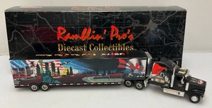 1999 ERTL Collectibles Ramblin Pros Patriotic Series Limited Edition 1 Of 10,000 World Trade Center Miniature 164 Scale Die Cast Tractor Trailer Plastic Slightly Yellowed
