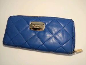 Blue quilted leather Michael Kors zip-around continental wallet