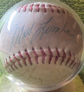 Interesting 1991 World Series Team Combo Autographed Ball by Mark Lemke, Greg Olson, Kevin Tapani, & Dave Justice 