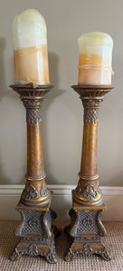 Ornate Pair of Bronze-Tone Candlesticks With Cream Candle Forms - 23