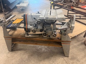 Fox Super Shop wood & metal machine, functions as a table saw, disc sander, wood lathe, drill press, horizontal borer, and router-shaper.