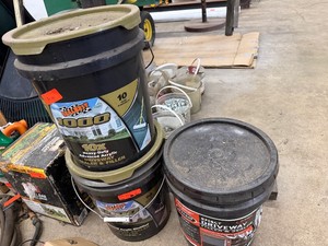 Three Pails of Seal Beast Black Top Sealer