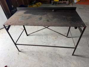 Heavy Duty Metal Table, 29 deep, 58-12 wide, 316 table thickness , 4 tall with 4 back,
