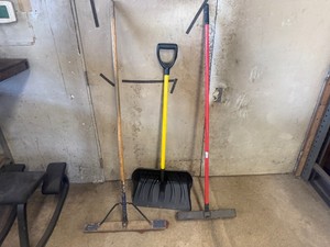 Two Push Brooms and a Snow Shovel