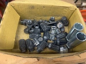 One Box of 23 Lug Nuts and Sockets - Various Sizes