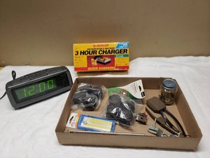 Eveready Rechargeable Battery 3 Hour Charger with AMFM Digital Clock Radio and Various Hardware Including Plastic Casters