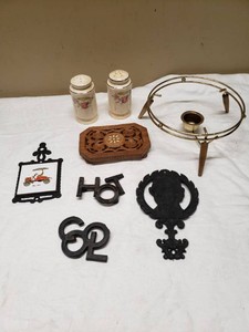 Metal Trivet, Decorative Salt and Pepper Shakers (cracked), Miniature Brass Stand, and Trivets